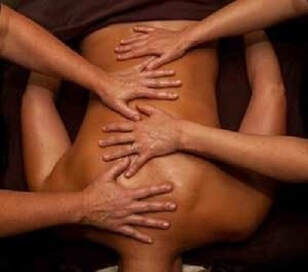 Picture of 4 Handed Massage on man's back at Shanghai Massage