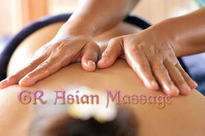 Picture of getting the best back massage at GR Asian Massage call 616-329-4110 today.